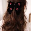black hair bow