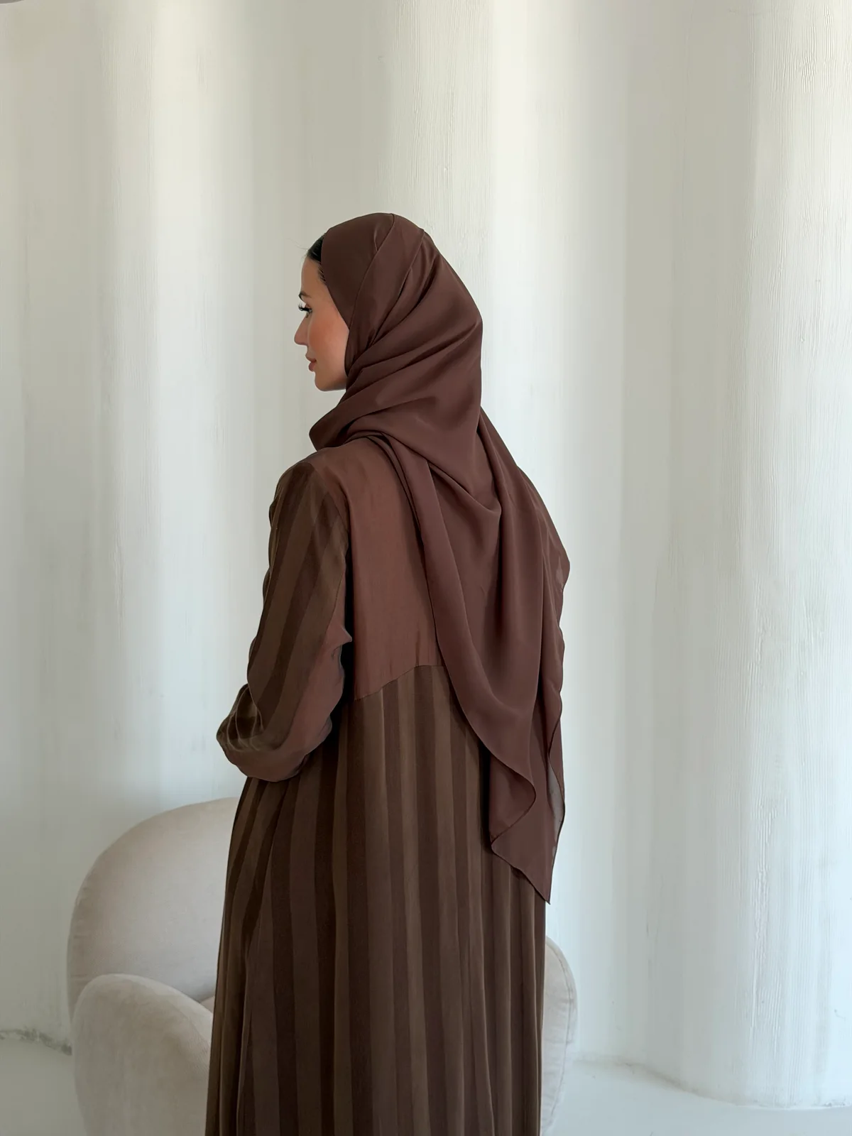 Brown Collared Abaya with Vertical Pleats in Striped Cobra silk - additional angle | JAAZLINE JZA26-15