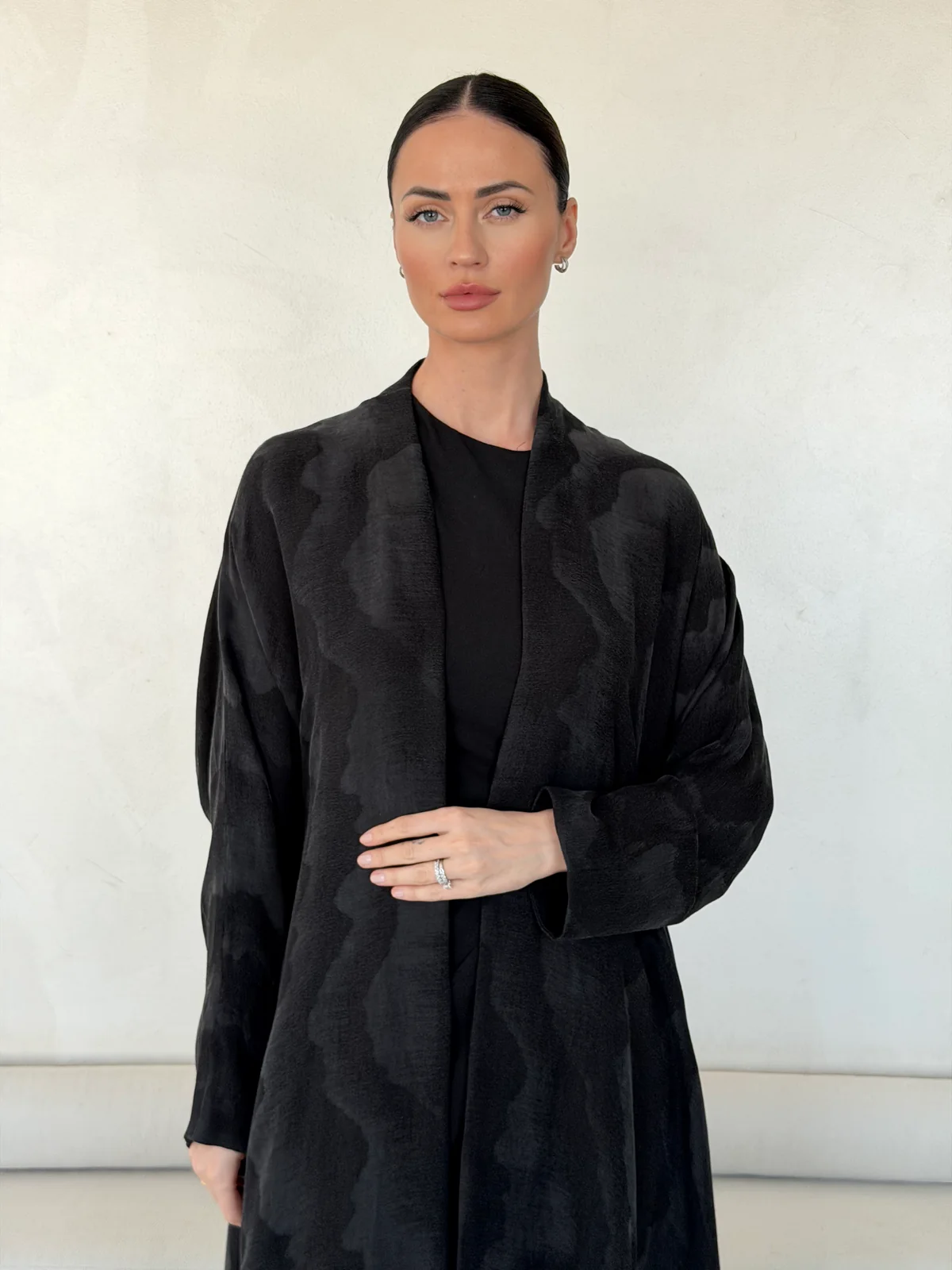 Black Abaya with Large Flowing Motif in Washed slub jacquard - fabric and design detail | JAAZLINE JZA26-20
