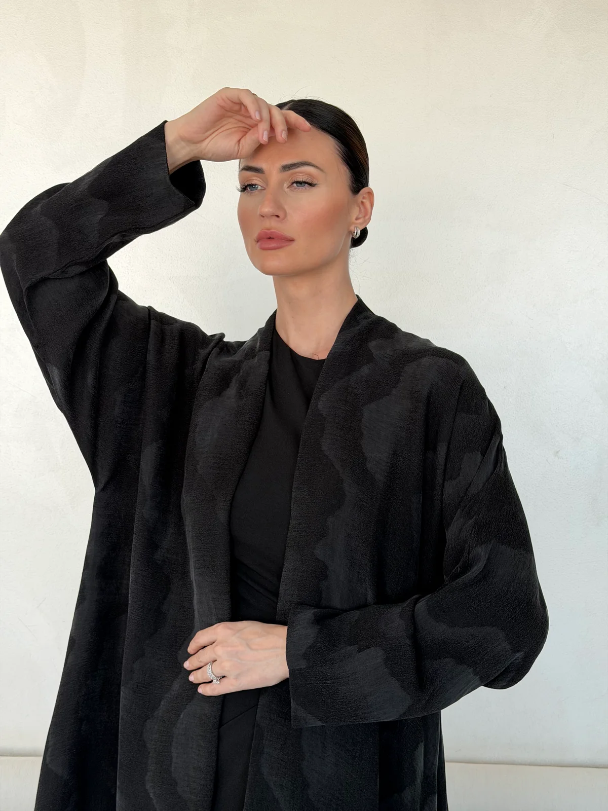 Black Abaya with Large Flowing Motif in Washed slub jacquard - fabric and design detail | JAAZLINE JZA26-20